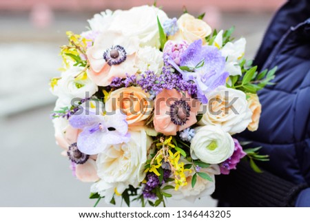bouquet of flowers lilac rose Narcissus hyacinth Ranunculus Tulip Bush rose chrysanthemum eucalyptus anemone peony in a florist shop