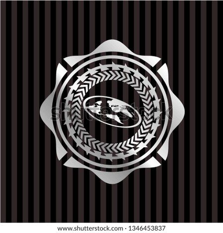 flat earth icon inside silver emblem