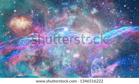 Nebula and stars in deep space. Science fiction wallpaper. Elements of this image furnished by NASA.