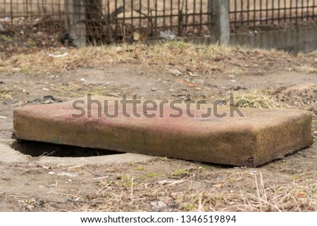 an old mattress in the street Royalty-Free Stock Photo #1346519894