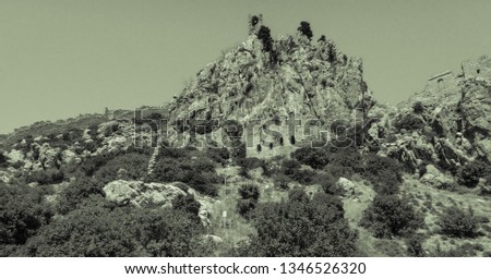 Old photo view of Saint Hilarion Castle. Kyrenia mountain range. Cyprus island