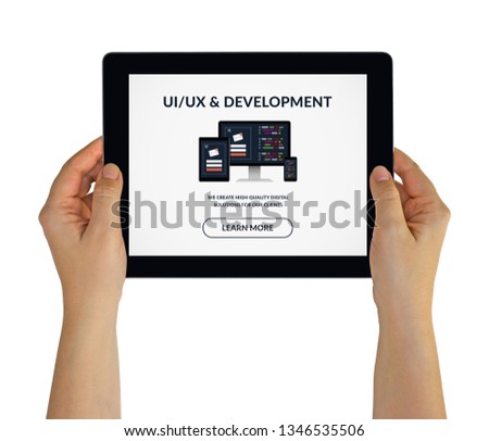 Hands holding digital tablet computer with UI/UX design and development concept on screen. Isolated on white. All screen content is designed by me
