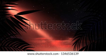 Background of brick walls in a dark room with neon light, illuminated illumination, searchlight light in the dark. Tropical leaves, shade, smoke. Night view