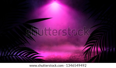 Dark street, brick wall, fog, smog, smoke. Neon light. Dark street background, night view. Blue, purple light, tropical leaves.