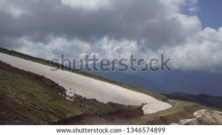 Aerial shot of snake road high at roza khutor mountains