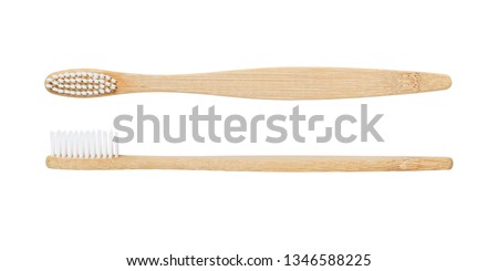 Bamboo toothbrush isolated on white background Royalty-Free Stock Photo #1346588225