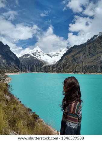 Laguna Paron, Huaraz, Peru. A blue-green lake in the Cordillera Blanca on the Peruvian Andes. At 4185 meters above sea level, it's surrounded by snowy peaks and a pyramid mountain. 