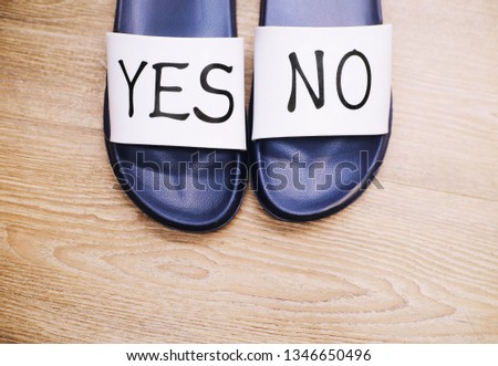 Sandals have the words yes and no