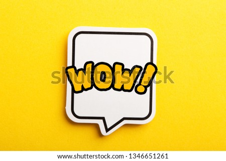WOW concept speech bubble isolated on yellow background.