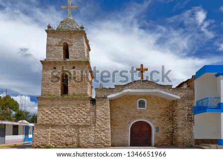 Beautiful and old infrastructure of an old stone church located in the main square of Canchayllo.