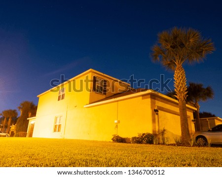 A typical Florida house at night	