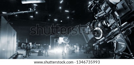 Behind the scenes of making of movie and TV commercial. Film Crew .B-roll. Camera of movie and video production and crew team in studio and set. Black and white.