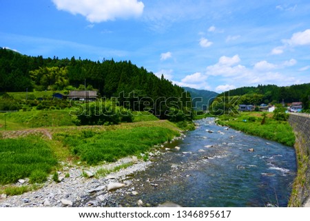 Japanese rural area in summer.This place is Kesengawa River.Rikuzentakata Iwate Japan.Early July.  Royalty-Free Stock Photo #1346895617