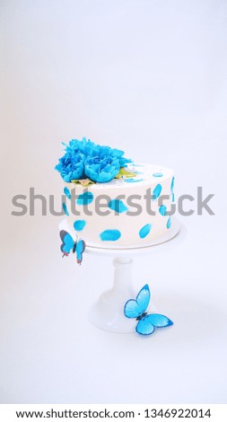 
blue peony cake on white background