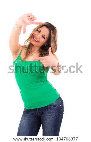Young woman making framing key gesture - isolated over white