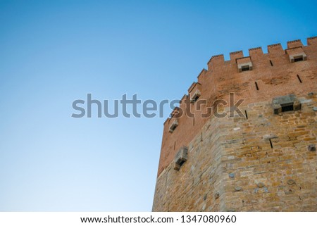 Reconstructed tower of a fortress in Turkey. Bottom view with a copy space.