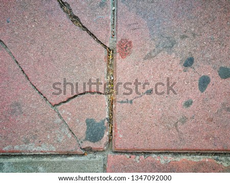 close up cracked concrete brick surface background, geometry abstract on pathway block texture
