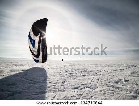 Tolyatti, Russia  - February 5-8: All-Russian competition for snowkiting 'Marathon Zhigulevskoye Sea 2015' Royalty-Free Stock Photo #134710844