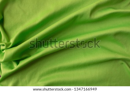 Green fabric texture for background and design art work, beautiful pattern Synthetic fabric.