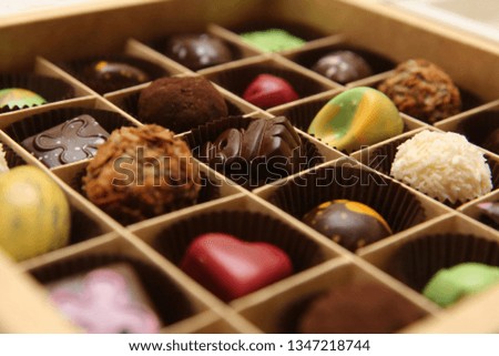 Chocolate candies in box isolated 
