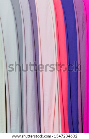 Photo picture Samples of colored cloth background texture. crumpled fabric. verticak photo