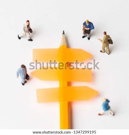 Orange arrows with miniature people