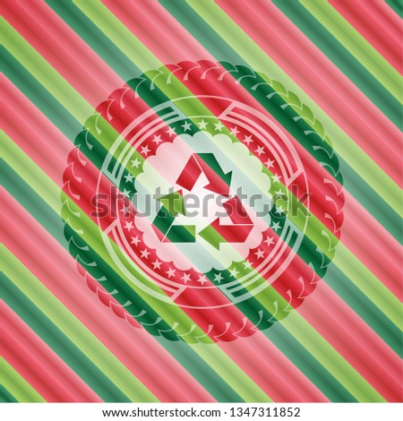 recycle icon inside christmas colors style emblem.