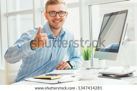 Business man working at office with laptop and documents on his desk, consultant lawyer concept with good, well sign by hands Royalty-Free Stock Photo #1347414281