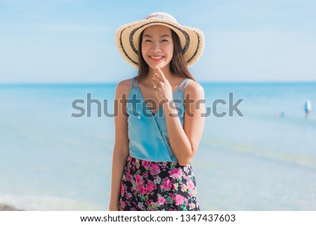 Portrait beautiful young asian woman happy smile relax around beach ocean and sea for leisure travel and vacation