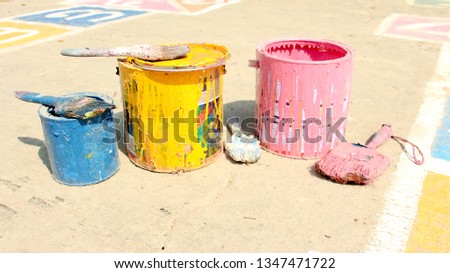 Paint can and paint brush background.