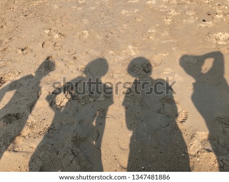 Abstract image of a shadow people on the beach in the sea