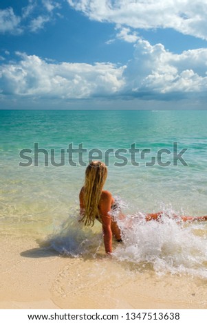 Young woman at the tropical beach at Phi Phi islands