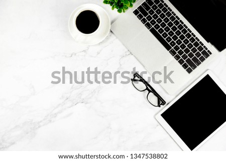 Workspace in office , Marble White desk with blank notebook and other office supplies,Top view with copy space.