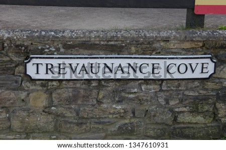 Traditional Metal Name Plate for the Cornish Seaside Village of Trevaunance Cove on the South West Coast Path in Rural Cornwall, England, UK