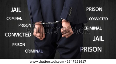 Jail convicted prison criminal labels with close handcuffed man
