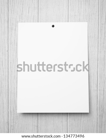 blank poster on a wood wall