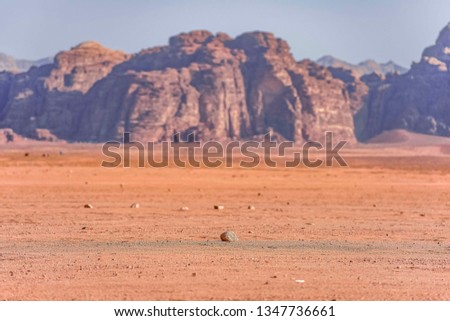 
incredible lunar landscape in Wadi Rum in the Jordanian red sand desert. Wadi Rum also known as The Valley of the Moon,  Jordan - Image