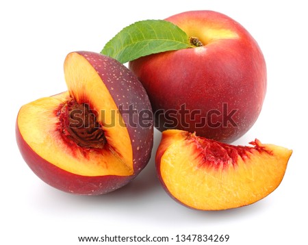 Nectarine peaches with slice and leaf isolated on white background Royalty-Free Stock Photo #1347834269