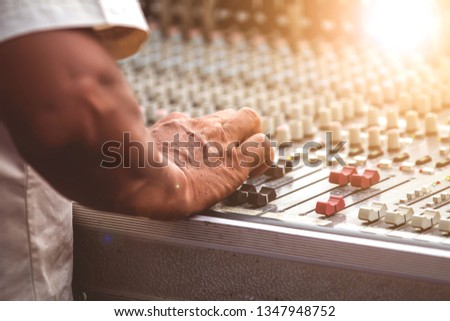 Mixer,Audio Mixer Sound Adjusting Closeup Photo. Professional Sound Mixer Operator.
