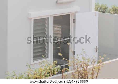 Close up of a house leaving the backdoor open. Virus and spyware backdoor concept allow hacker to hack and access the data or robber to steal the valuable stuff inside.