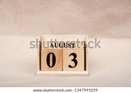 August 3rd. Image of August 3 wooden color calendar on white canvas background. empty space for text