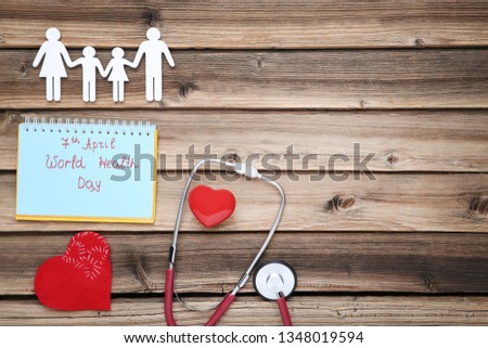 Text 7 April, World Health Day with stethoscope and family figure on wooden table