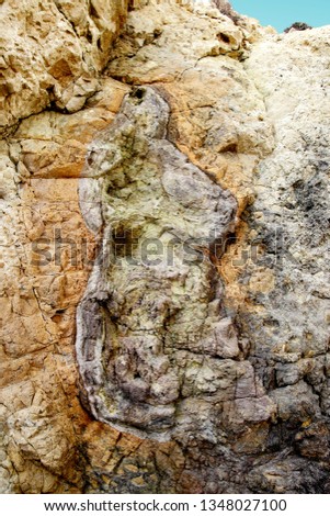 indiana Jones movie stage and the last crusade, tongues of lava eroded by the sea, the auto clastic gaps or pyroclastic andesite, The petrified wave, beach of Mónsul, Natural Park, Cabo de Gata, spain Royalty-Free Stock Photo #1348027100