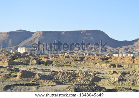 Amazing nature view of stone desert with mountains peaks and beautiful clouds. Location:Africa. Artistic picture. Beauty world. The feeling of complete freedom - Image
