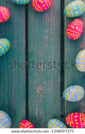 Choclate Easter eggs, background,  different easter eggs lie on a green wooden bench, poster, wallpaper, postcard