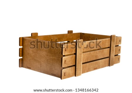 Empty wooden box on white background. Isolated object. A box of vegetables and fruits. Royalty-Free Stock Photo #1348166342