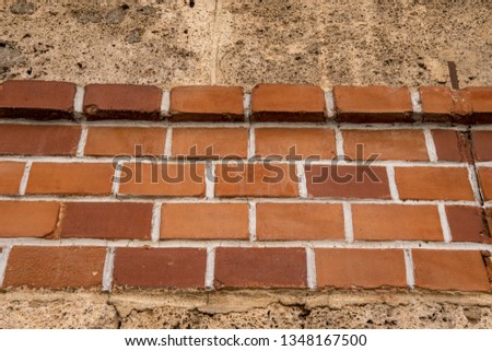 brick wall embedded in a house wall