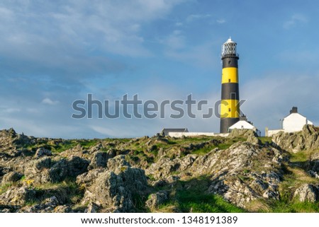 This is a picture of St John's Point Lighthouse  on the east coast of Northern Ireland on the Irish Sea.  It is one of Irelands many iconic coastal lighhouses