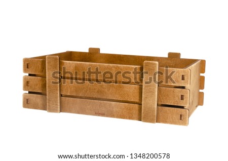 Empty wooden box on white background. Isolated object. A box of vegetables and fruits. Royalty-Free Stock Photo #1348200578