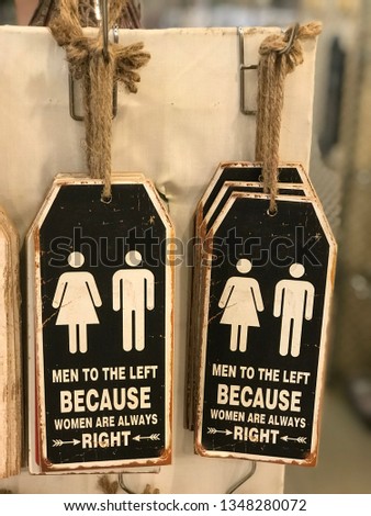 Funny men versus women signage